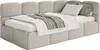 A modern, modular bed with a bouclé fabric cover, shown with bedding and pillows. Produktbild-Vorschau