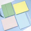 Four tablet cases in different pastel colors are laid out on a light blue and white background. Produktbild-Vorschau