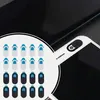 Sortiment aus weißen und schwarzen Webcam-Abdeckungen mit blauen Schiebern, eine schwarze Abdeckung auf einer Smartphone-Kamera angebracht Produktbild-Vorschau