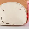 Close-up of a child's backpack with a cartoon face design. Anteprima dell’immagine prodotto