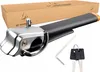 A steering wheel lock and its accessories are displayed on a white background, with the product packaging in the background. Náhľad obrázku produktu
