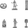 A collection of small metal tokens, likely game pieces, arranged on a white background. Produktbild-Vorschau