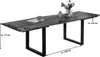 A dining table with dimensions shown, set up in a studio environment. Produktbild-Vorschau