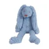 A blue plush rabbit toy is sitting on a white background. Náhled obrázku produktu
