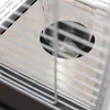 A close-up view of a gas heater's burner assembly, seen through a metal grate. Produktbild-Vorschau