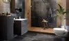 A modern bathroom with a toilet, sink, and shower. Produktbild-Vorschau