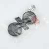 A pair of black ear pads and a headband pad are shown inside a clear plastic bag, with a logo and text visible on the packaging. Produktbild-Vorschau