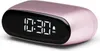 A pink digital alarm clock with a black display showing the time. Produktbild-Vorschau