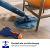 A close-up shot of a blue electric mop cleaning a wooden floor, with a chair in the background and a toy on the floor. Anteprima dell’immagine prodotto