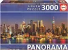 The image shows the packaging of a 3000-piece panoramic puzzle featuring a New York City skyline at night. Anteprima dell’immagine prodotto