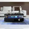 A modern living room with a white sofa and a black coffee table with LED lighting. Anteprima dell’immagine prodotto