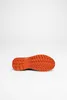 The sole of a shoe is shown against a white background. Voir les images du produit