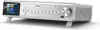 A silver and white Karcher RA 2060D-S Küchenradio (CD-Player, DAB+ / UKW Radio, Bluetooth, Timer, Fernbedienung) is shown from a diagonal front view, resting on two white legs. Produktbild-Vorschau