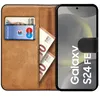 A wallet-style phone case with a Samsung Galaxy S24 FE phone inside, showing card slots and euro banknotes. Produktbild-Vorschau