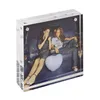 A clear acrylic photo frame with a picture of two women inside. Produktbild-Vorschau