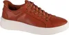 A brown leather SKECHERS sneaker with a white sole is shown against a white background. Náhled obrázku produktu