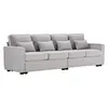 A light gray, four-seater sofa with multiple cushions, shown from a side-angle against a white background. Produktbild-Vorschau
