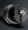 A close-up view of the tip of a safety hammer, showing its sharp point and textured grip. Náhled obrázku produktu
