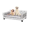 Two dogs are sitting on a silver pet sofa. Náhled obrázku produktu