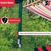 A close-up view of a green metal post with a hammock attached, set in a garden with lush green foliage. Produktbild-Vorschau