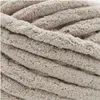 A close-up view of thick, textured chenille yarn, showing the ribbed texture and soft fibers. Produktbild-Vorschau