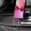 A smartphone is mounted in a car's dashboard, connected to an AUX port with a charging cable. Produktbild-Vorschau