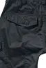 Close-up of a dark-colored cargo pocket on pants. Anteprima dell’immagine prodotto