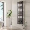 A modern bathroom with a bathtub, a plant, and a black heated towel rack mounted on the wall. Náhled obrázku produktu