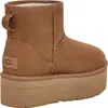 A side view of a single brown UGG boot with a platform sole. Produktbild-Vorschau