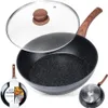 A black frying pan with a speckled finish and a wooden handle, shown with a clear glass lid and a product label. Produktbild-Vorschau