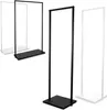 Two black metal garment racks are shown against a white background. One rack is in the foreground and is fully visible, while the other is in the background and partially obscured by the foreground rack. Produktbild-Vorschau