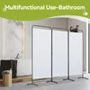 A bathroom scene with a bathtub and a three-panel room divider. Podgląd zdjęcia produktu