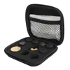 An opened black carrying case with black and gold joystick accessories inside. Produktbild-Vorschau
