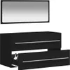 A black bathroom cabinet with a mirror above it. One drawer is partially open, revealing two bottles inside. Náhľad obrázku produktu