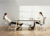 Two women working at desks with footrests. Náhľad obrázku produktu