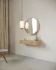 A minimalist bathroom or dressing area with a wall-mounted console, mirror, and pendant lights. Produktbild-Vorschau