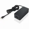 A black Lenovo laptop power adapter with a USB-C connector and a coiled cable, placed on a white background. Produktbild-Vorschau
