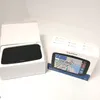 A TomTom navigation device is shown in its packaging next to the device itself in its box. Voir les images du produit