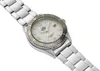 A silver watch with a white face and a rotating bezel is shown against a white background. Podgląd zdjęcia produktu