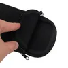 A hand is holding open a black neoprene sleeve, revealing the inside. Produktbild-Vorschau