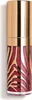A close-up shot of a cosmetic product with a gold cap and a red and gold zebra print design on the body. Podgląd zdjęcia produktu