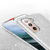A close-up view of a silver glitter phone case on a smartphone. Produktbild-Vorschau