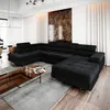 A modern living room with a sectional sofa, coffee table, and artwork. Podgląd zdjęcia produktu
