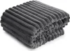 A folded gray blanket with a ribbed texture. Produktbild-Vorschau