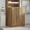 A bathroom storage unit with a wooden finish and white accents, featuring shelves and doors, set against a tiled wall. Náhled obrázku produktu