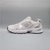 A single New Balance sneaker is shown against a plain gray background. Podgląd zdjęcia produktu