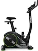 A studio shot of a black and green exercise bike against a white background. Podgląd zdjęcia produktu