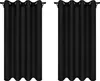 Two black curtains hanging on curtain rods. Produktbild-Vorschau