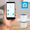 A hand holding a smartphone displaying an air purifier app, with a white air purifier in the background. Produktbild-Vorschau