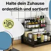 A kitchen counter with a spice rack organizer filled with various bottles and containers. Produktbild-Vorschau